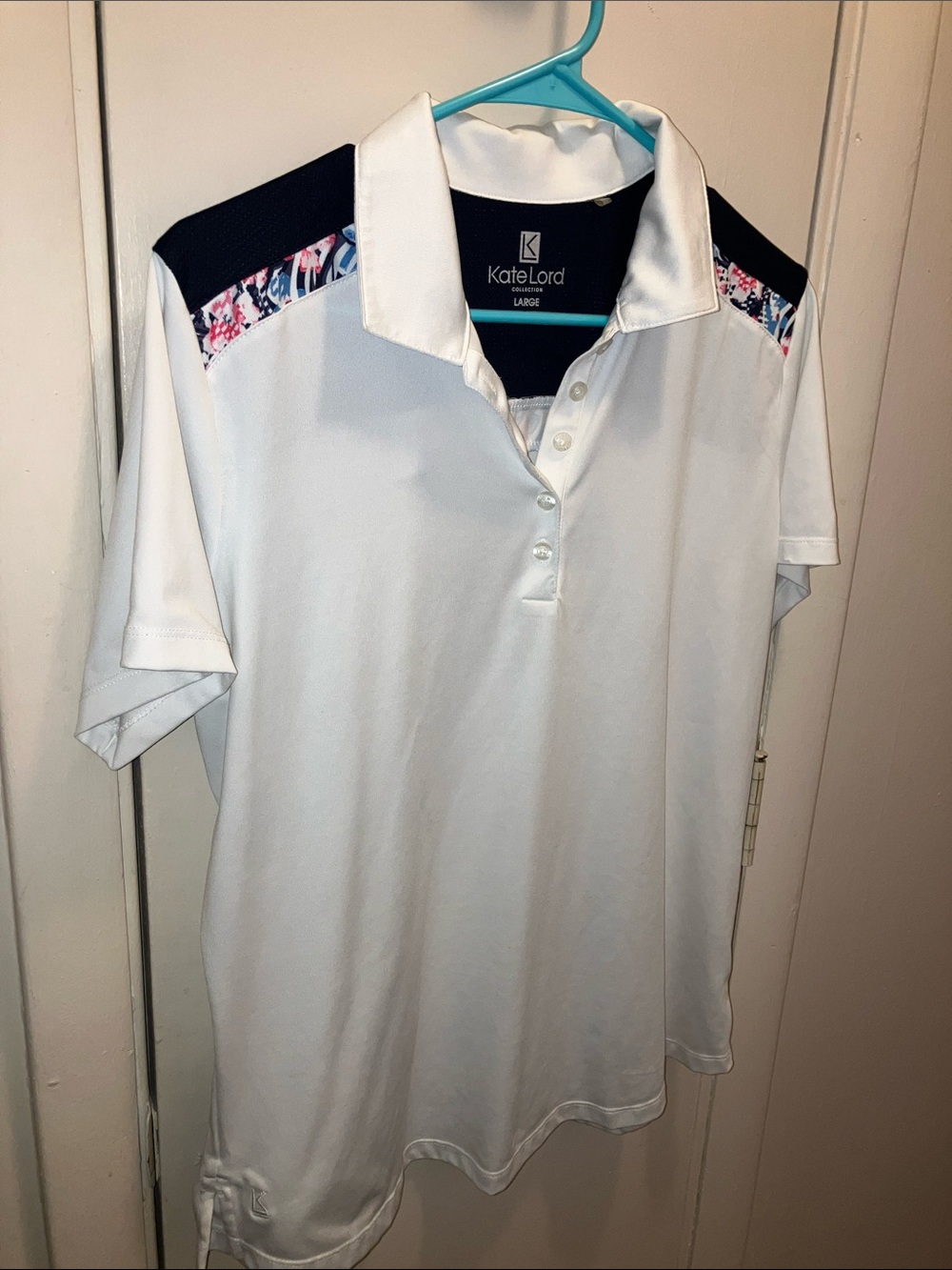 Kate Lord White Polo with Navy Shoulder Panels and Floral Trim Large